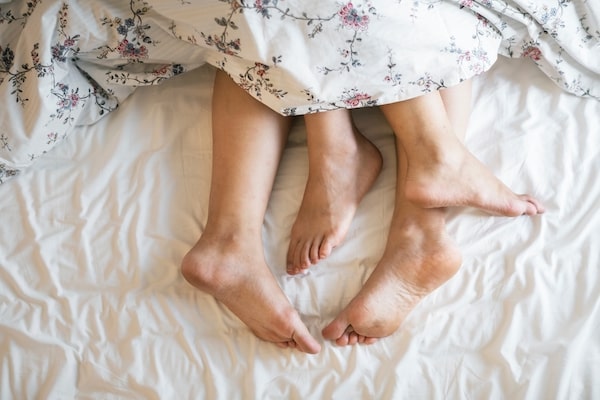 adults barefoot bed